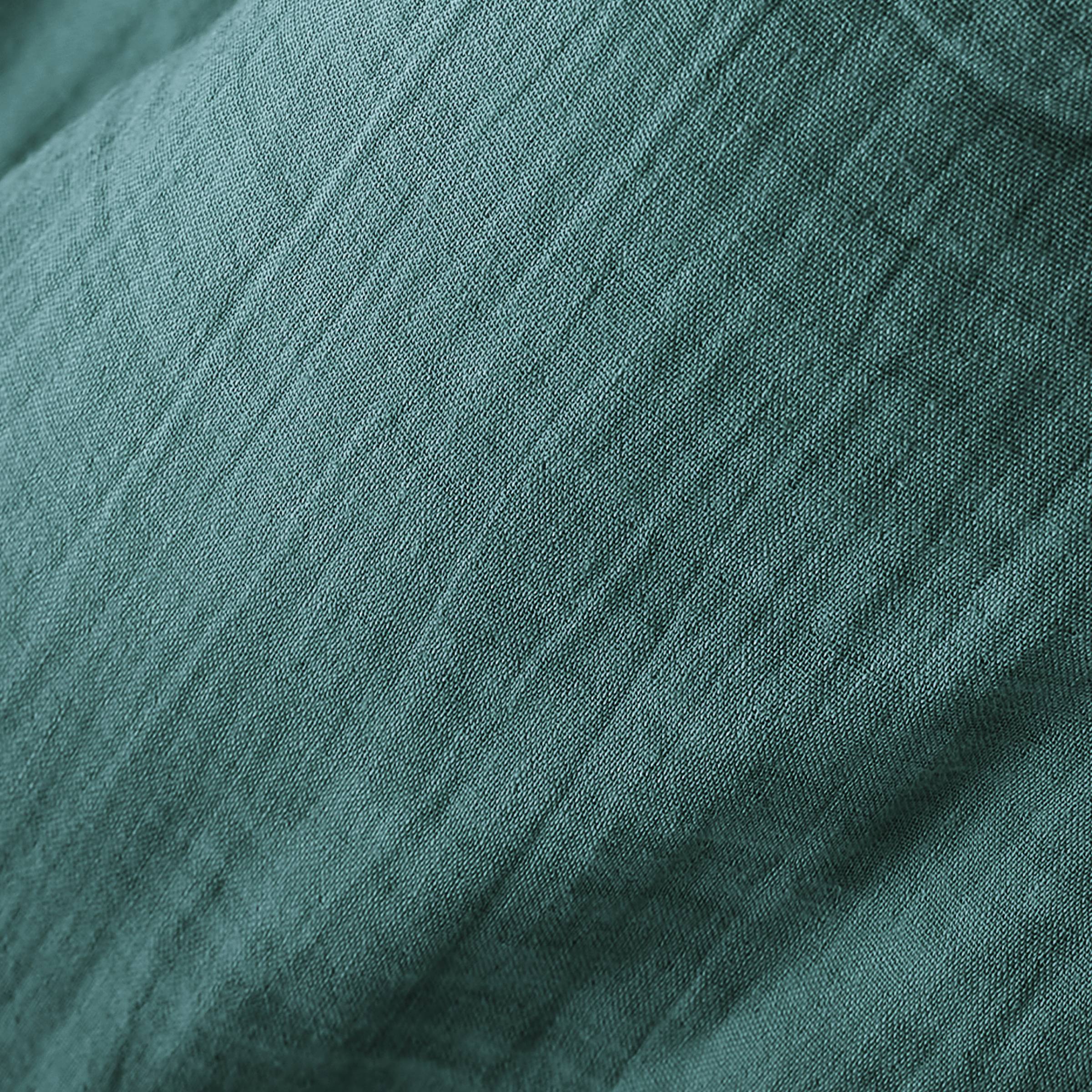 Duck blue muslin cushion