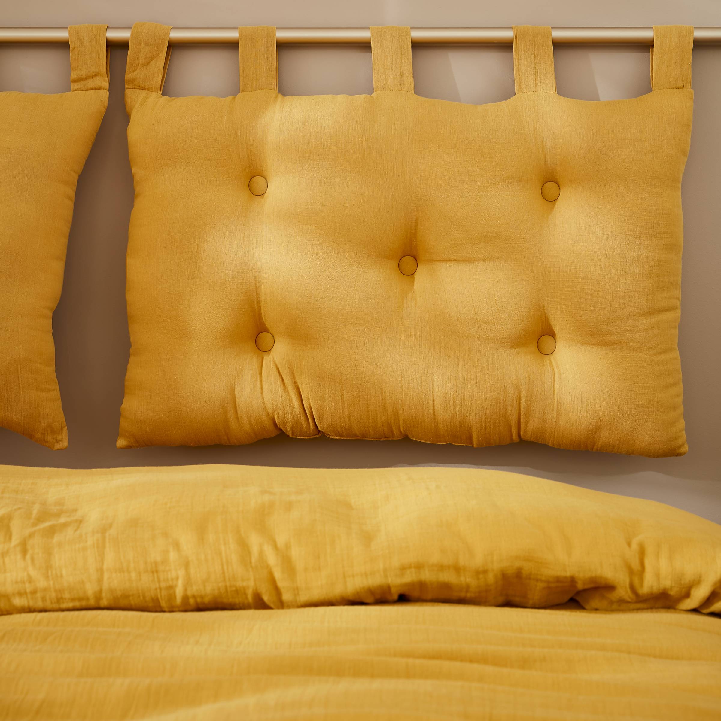 Saffron muslin headboard
