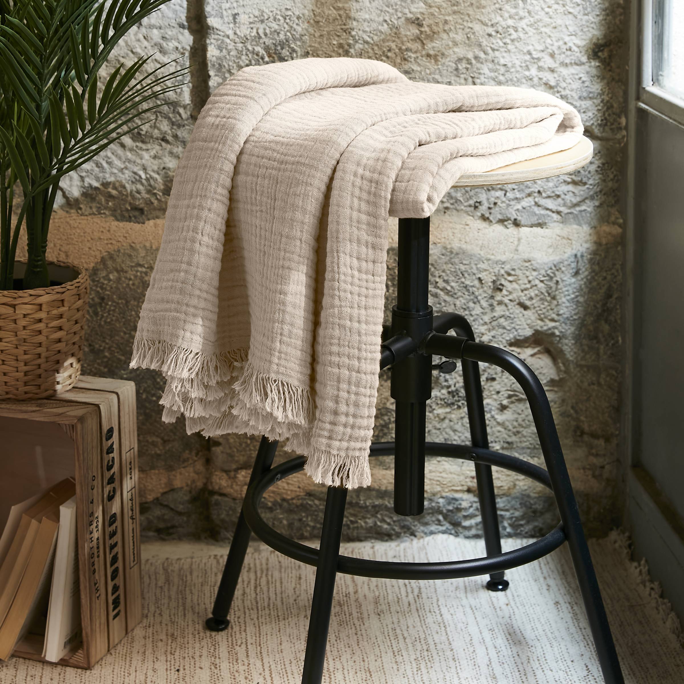 Beige muslin throw