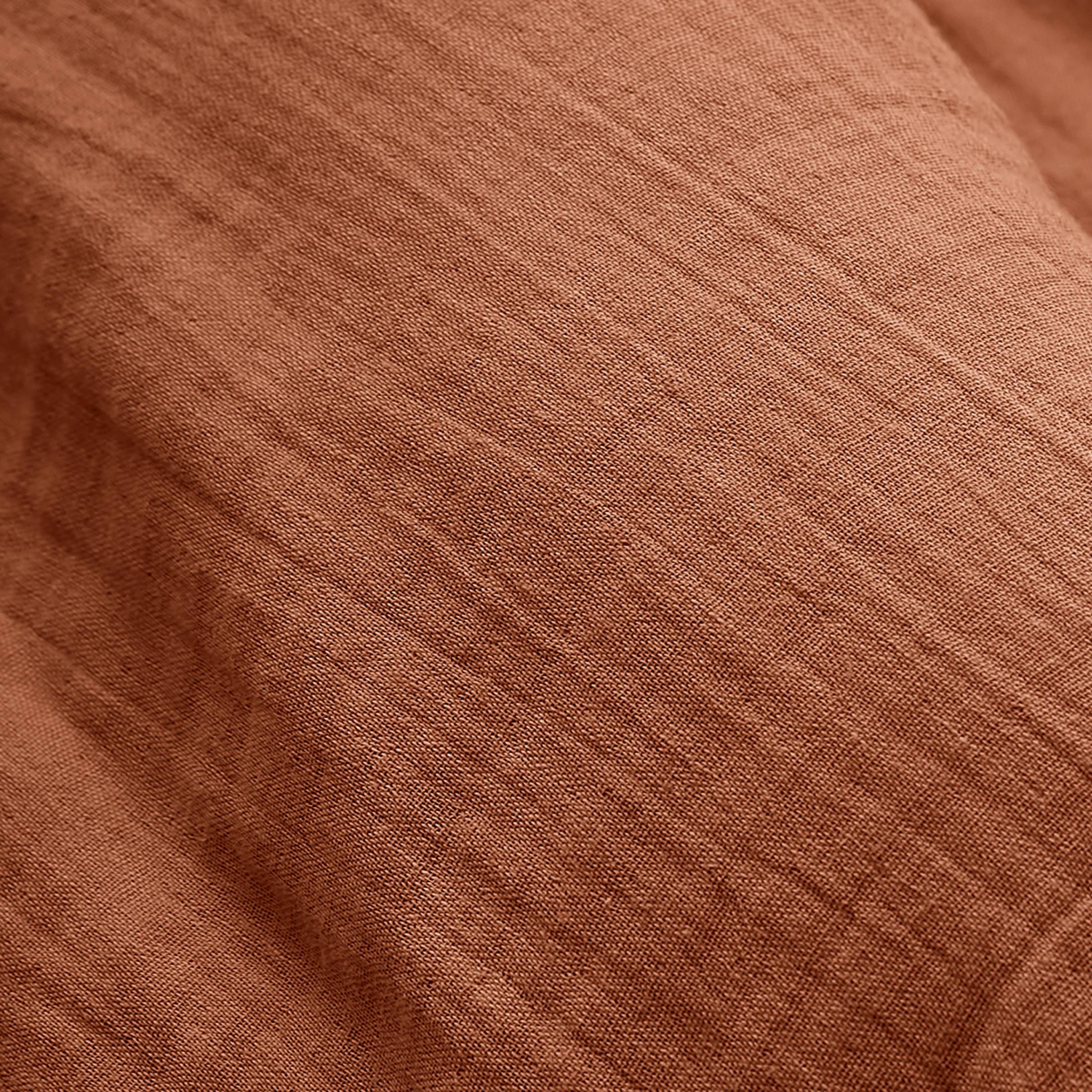 Terracotta muslin bed skirt