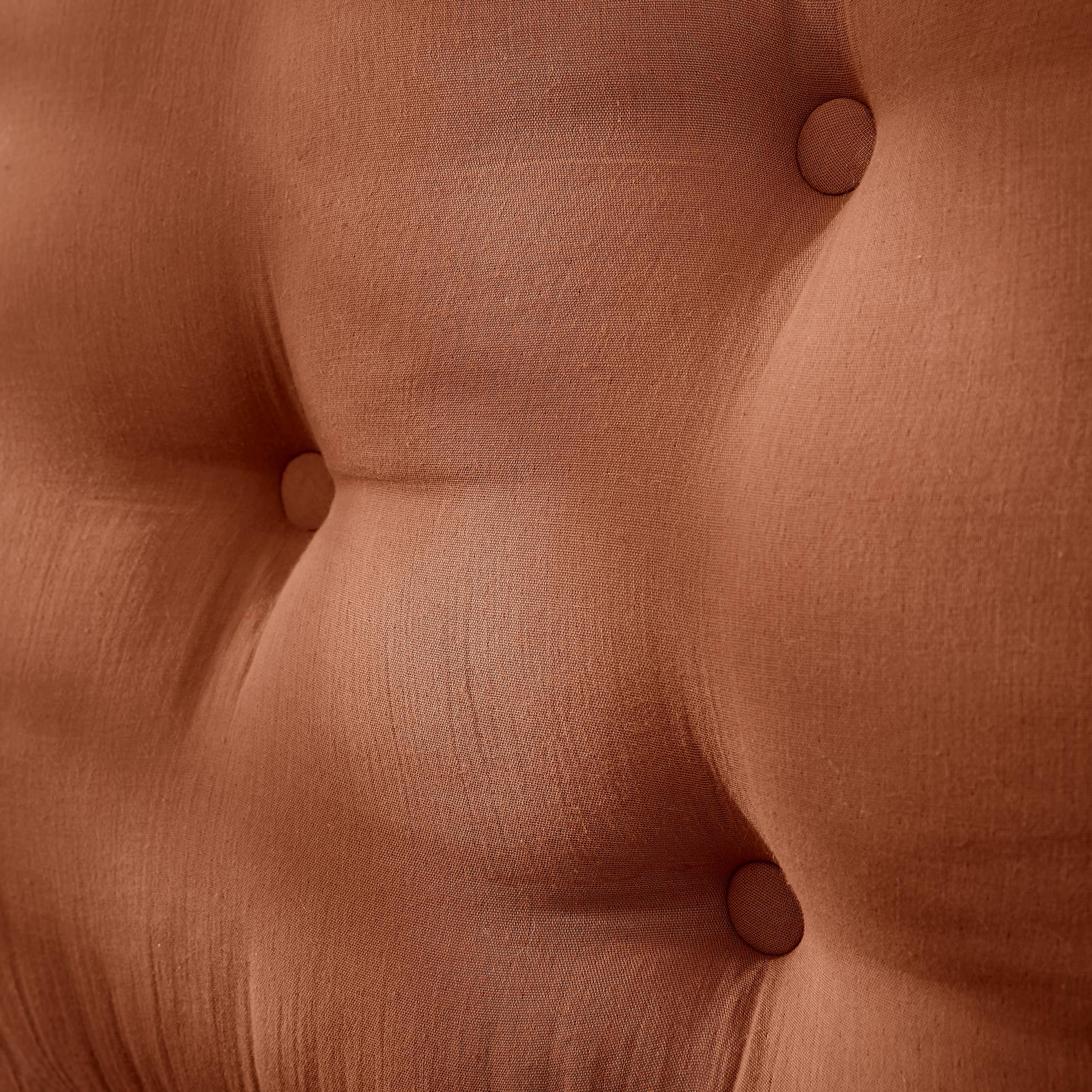 Terracotta muslin headboard