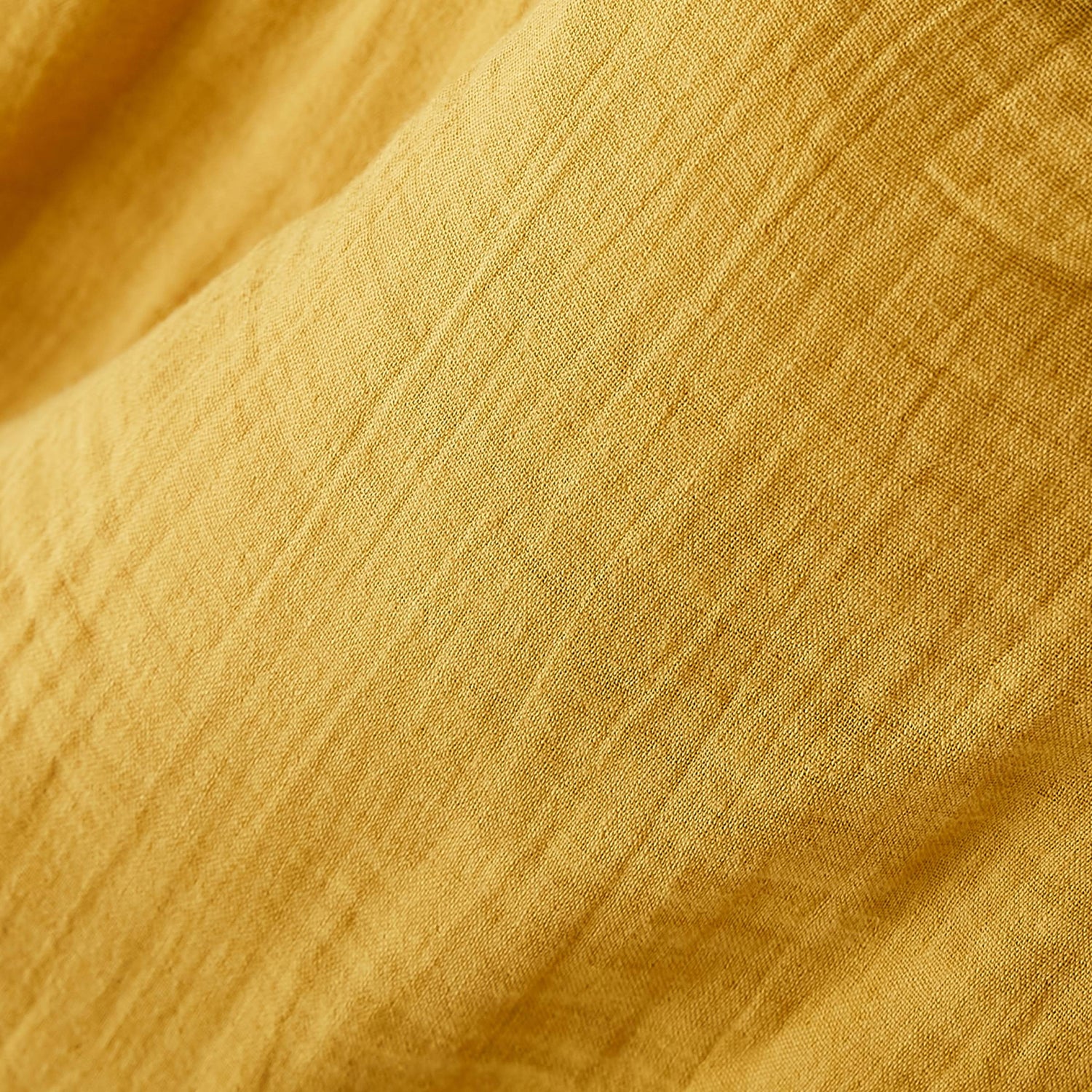 Saffron muslin bed skirt