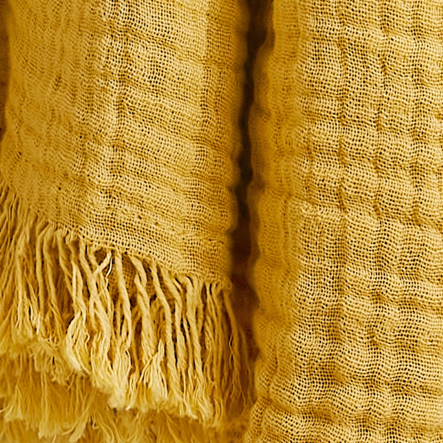 Saffron muslin throw