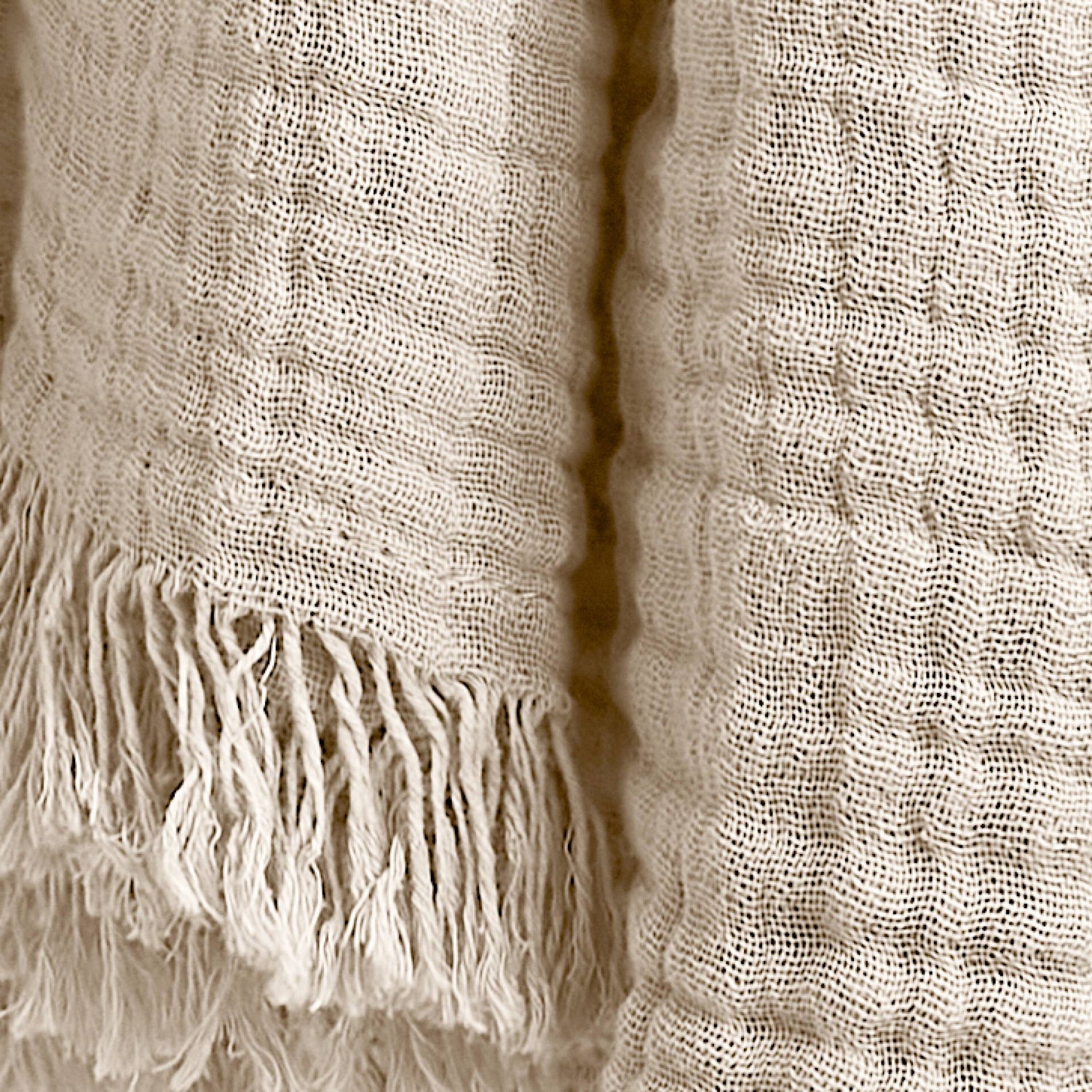 Beige muslin throw