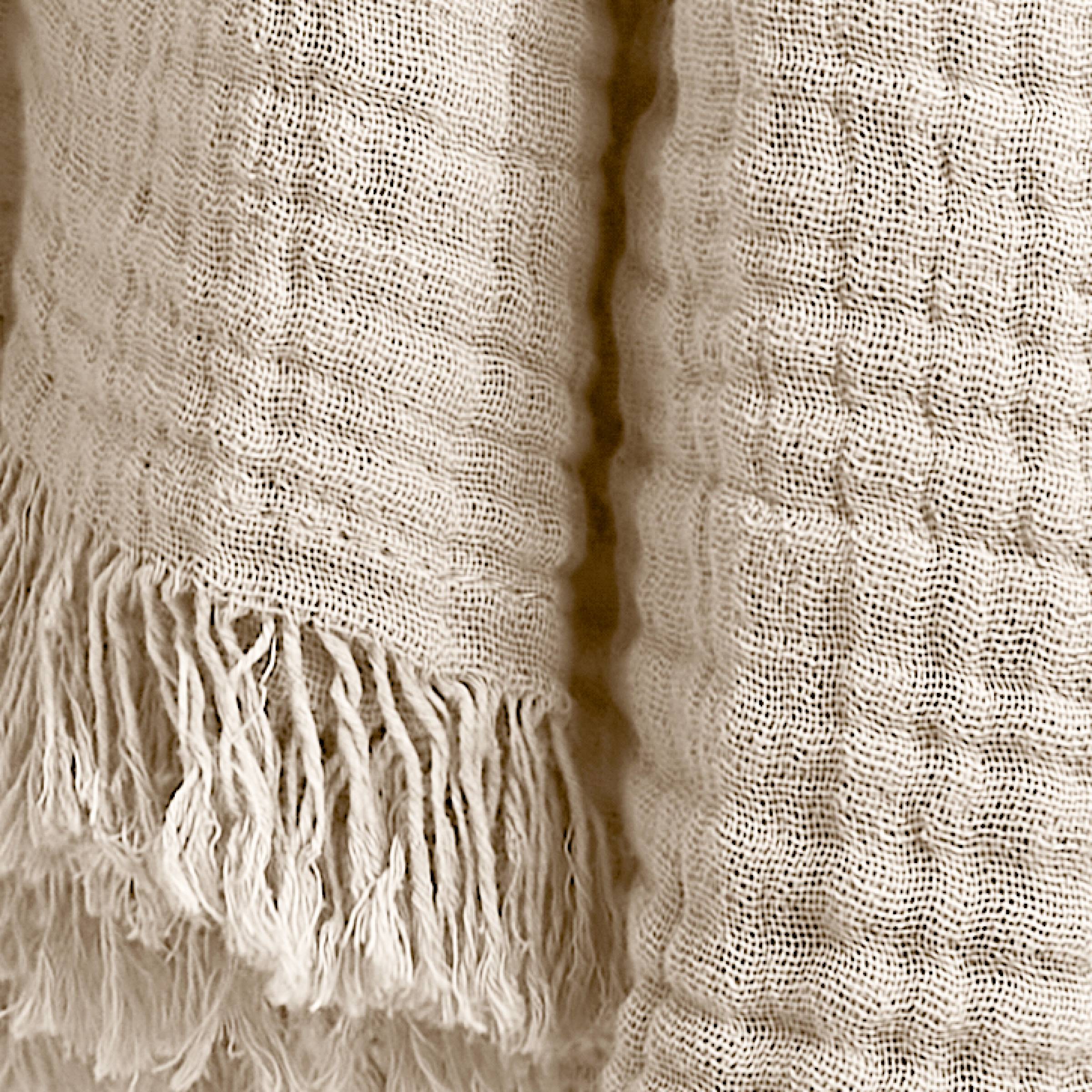 Beige muslin throw