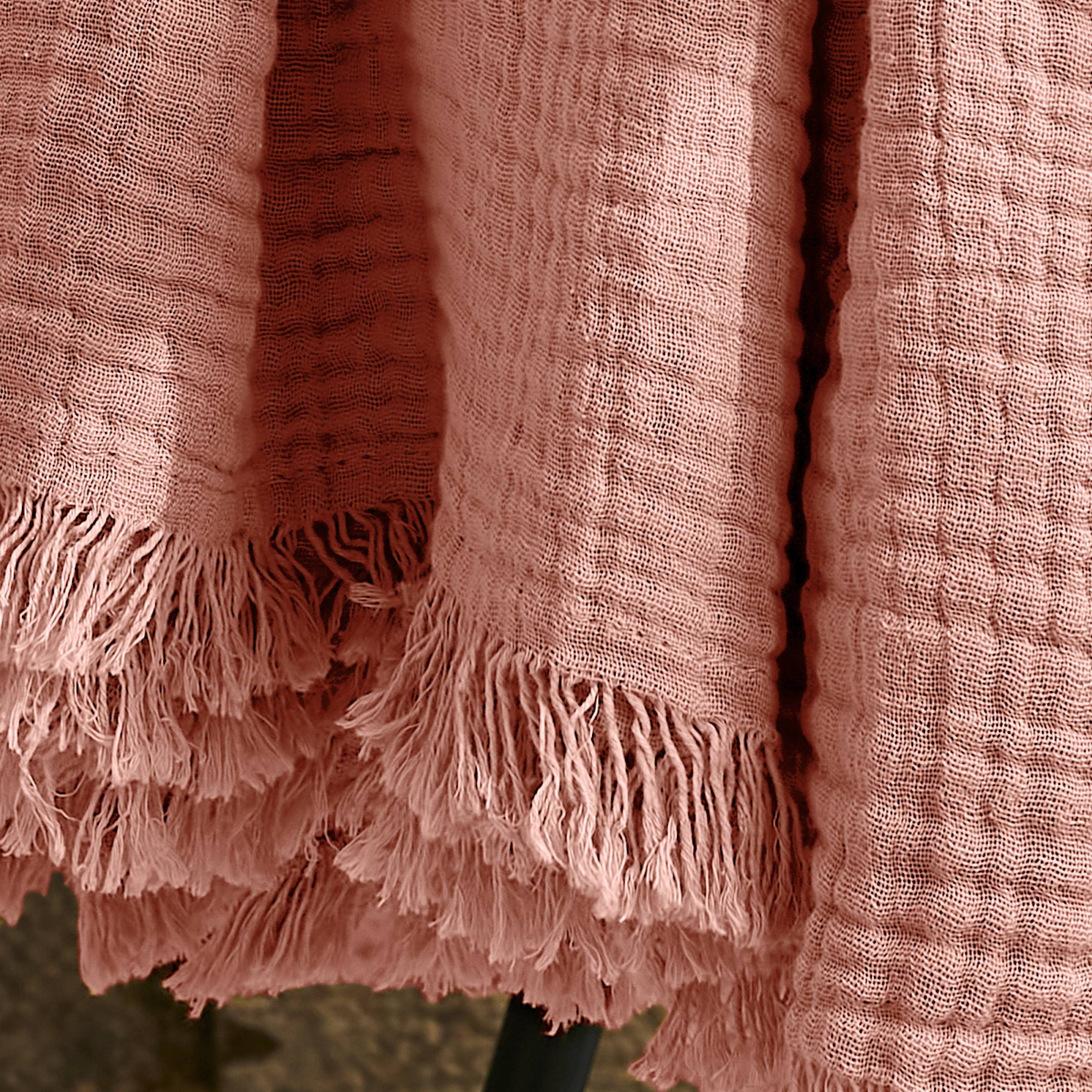 Peach pink muslin throw