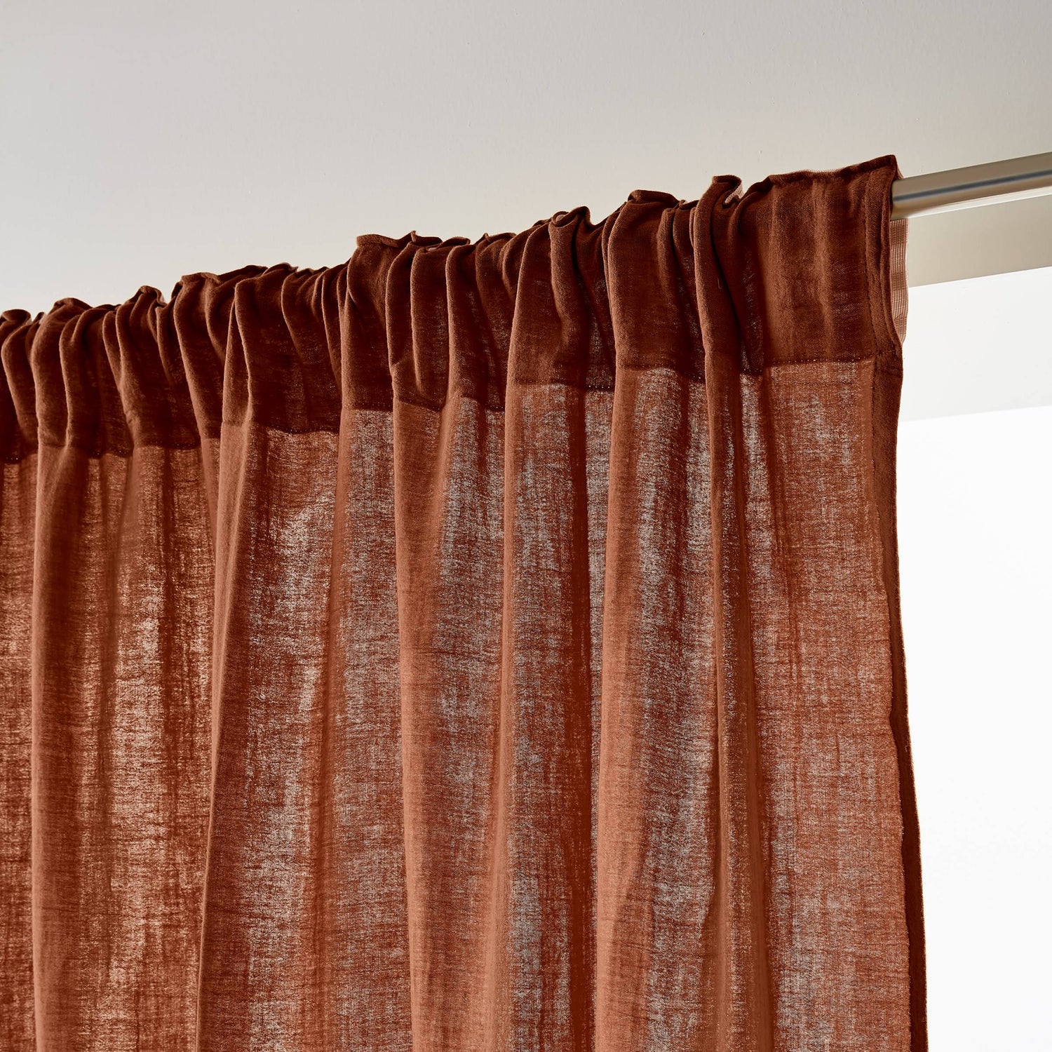 Terracotta muslin pencil pleat curtain