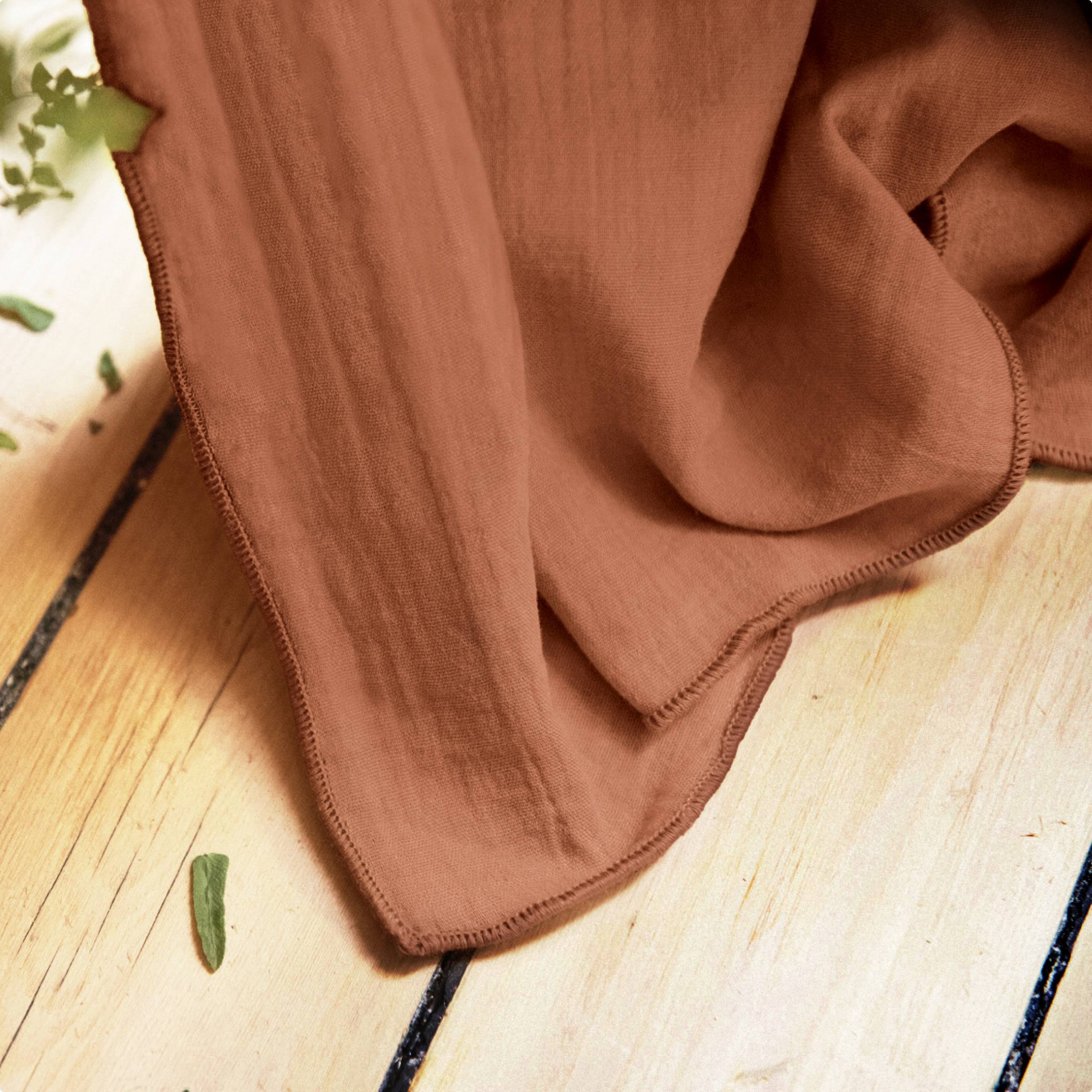 Terracotta muslin pencil pleat curtain