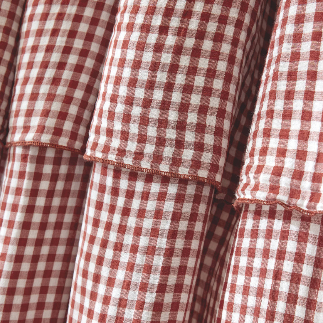 Terracotta gingham adjustable muslin curtain